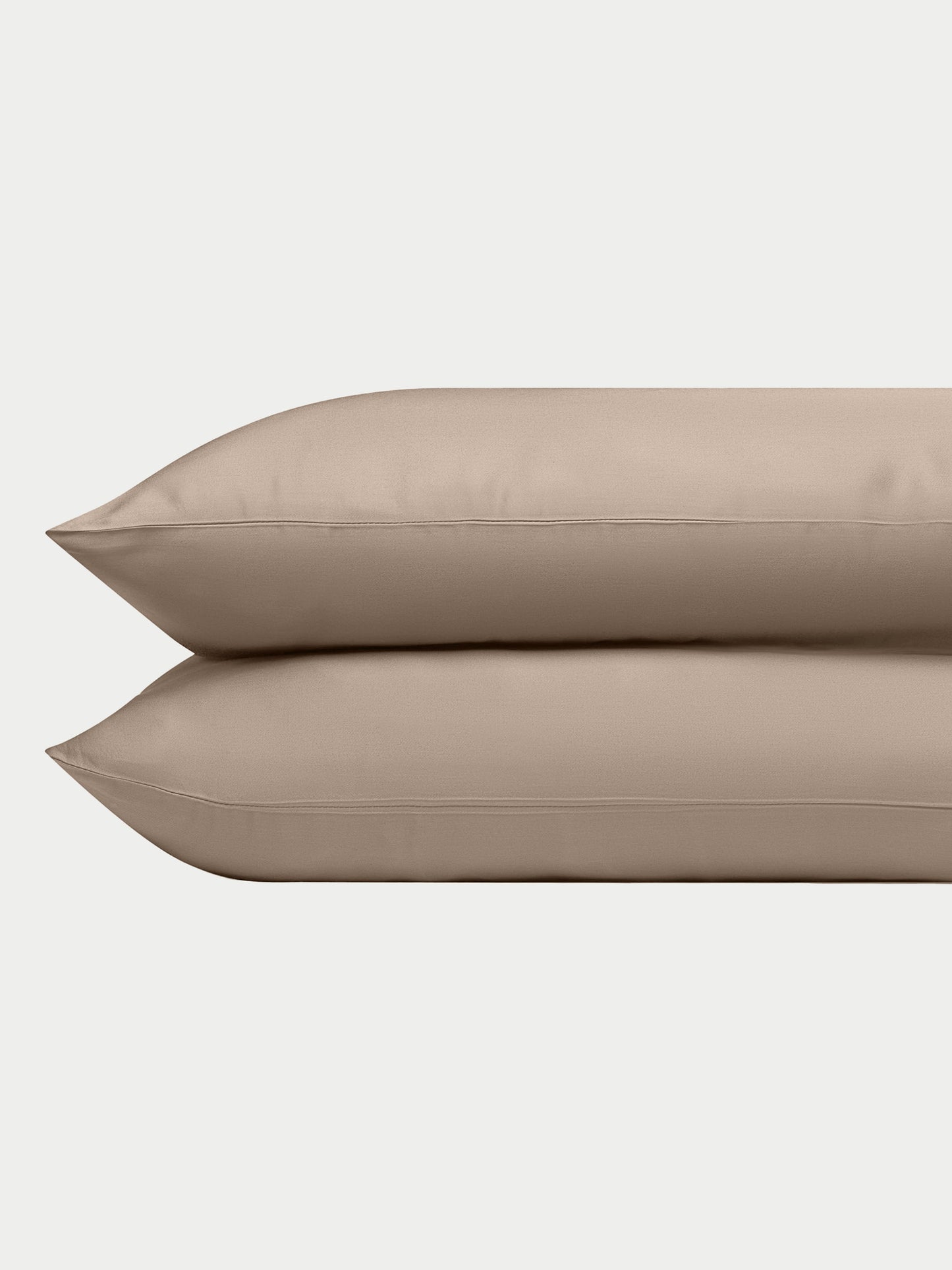 Two walnut pillowcases with a plain background standard/king/body