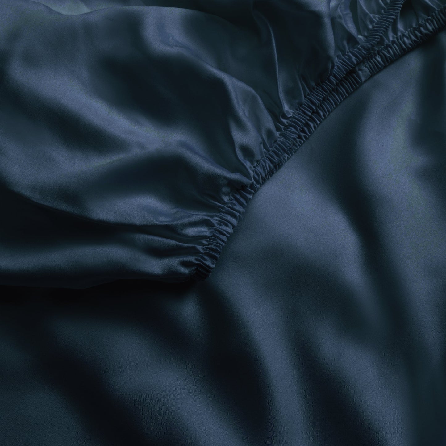 Close up of navy fitted crib sheet |Color:Navy