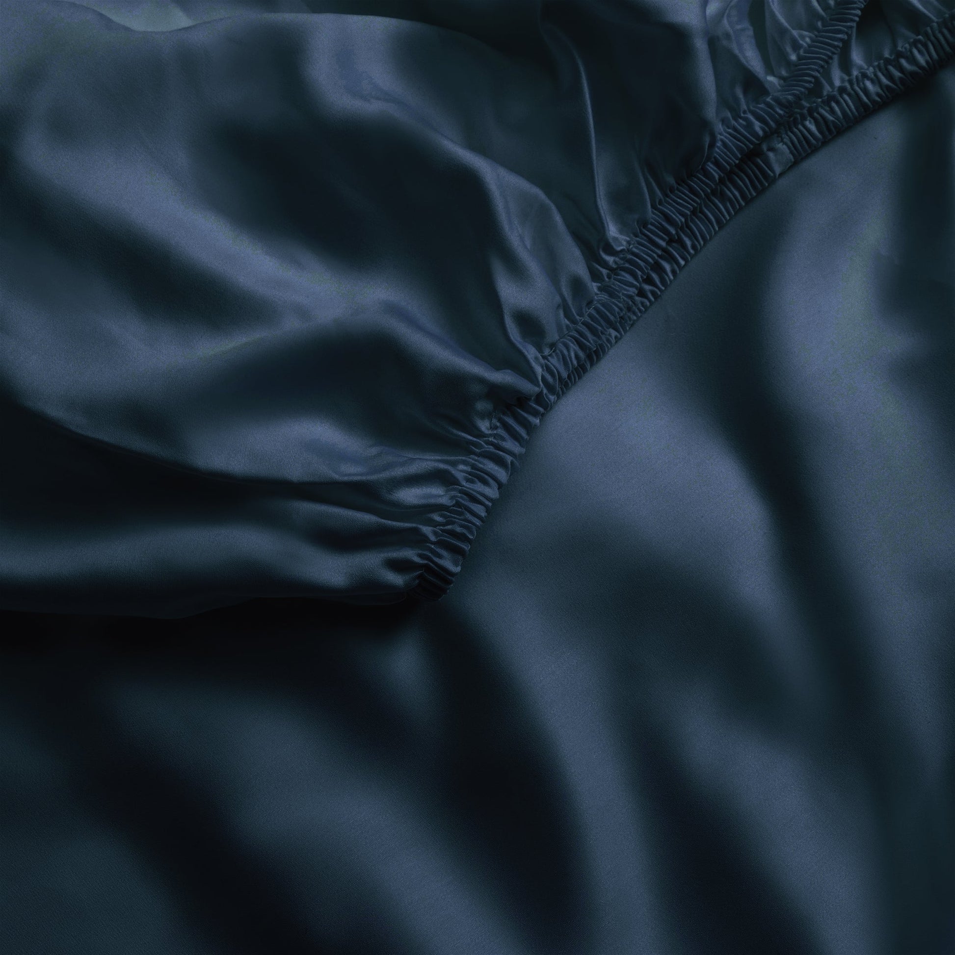 Close up of navy fitted crib sheet |Color:Navy